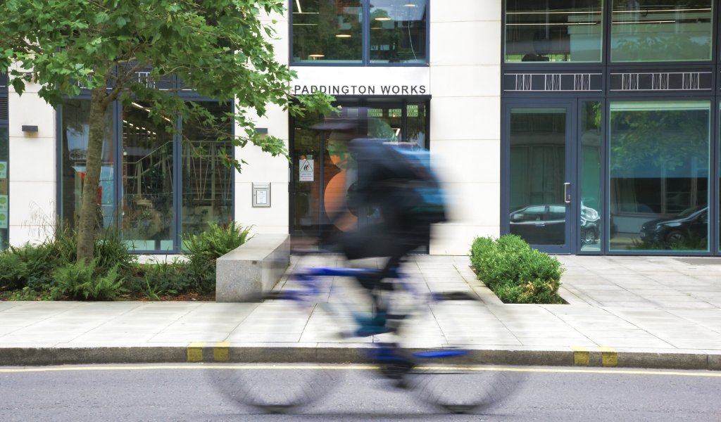 A man cycling to work in Paddington
